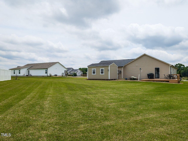 286 Beaver Tavern Dr, Benson, NC 27504 - back of house featuring a wooden deck and a lawn