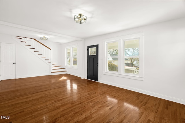 507 Price Ave, Durham, NC 27701 - foyer entrance featuring stairs, wood finished floors, and baseboards