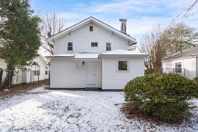 507 Price Ave, Durham, NC 27701 - snow covered rear of property featuring a chimney