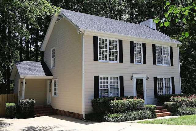 8116 Bentwood Pl, Raleigh, NC 27615 - colonial inspired home featuring a chimney and roof with shingles