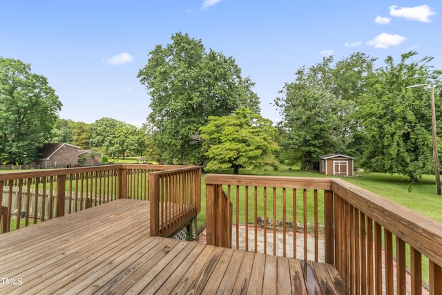 6411 Pondview Ln, Durham, NC 27712 - deck with a lawn and view of wooded area