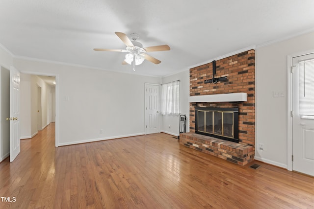 6411 Pondview Ln, Durham, NC 27712 - unfurnished living room with ceiling fan, hardwood / wood-style floors, baseboards, and ornamental molding