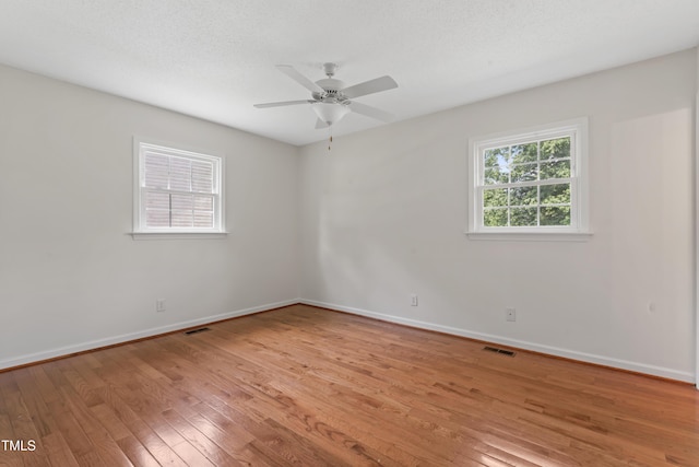 6411 Pondview Ln, Durham, NC 27712 - empty room featuring light wood-type flooring, baseboards, and ceiling fan