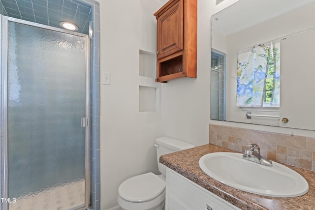 6411 Pondview Ln, Durham, NC 27712 - full bathroom with toilet, vanity, a stall shower, and decorative backsplash
