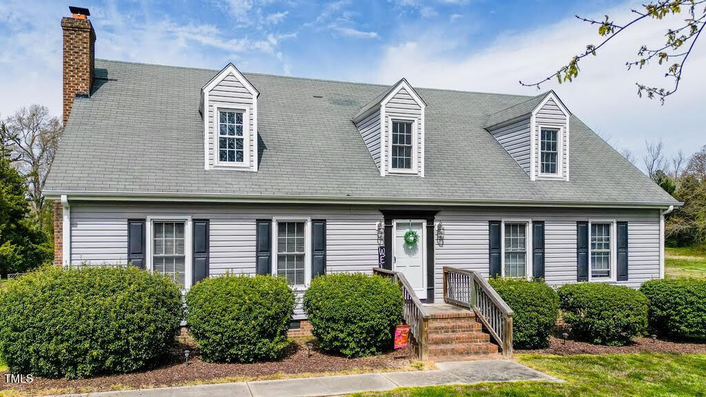 110 W Quail Ridge Rd, Oxford, NC 27565 - cape cod-style house with a chimney