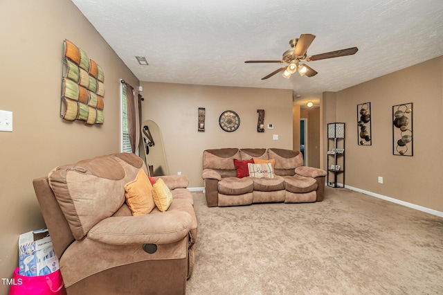 1515 Mack St, Spring Lake, NC 28390 - carpeted living room with a ceiling fan, baseboards, and a textured ceiling