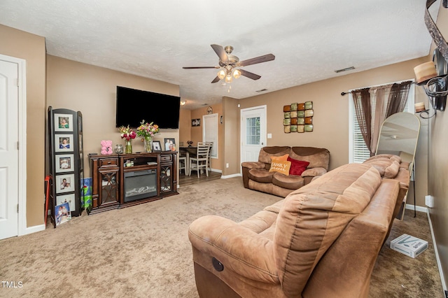 1515 Mack St, Spring Lake, NC 28390 - carpeted living room featuring ceiling fan and baseboards
