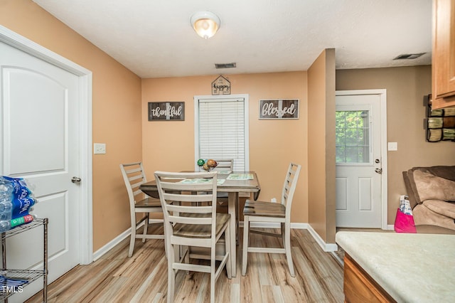 1515 Mack St, Spring Lake, NC 28390 - dining area featuring light wood finished floors and baseboards