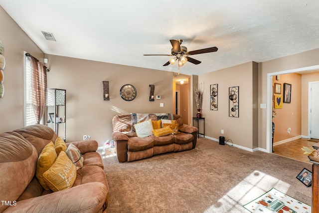 1515 Mack St, Spring Lake, NC 28390 - living area featuring ceiling fan, carpet flooring, and baseboards
