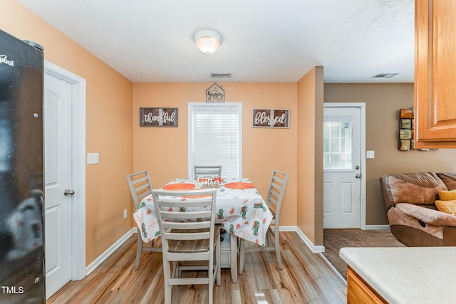 1515 Mack St, Spring Lake, NC 28390 - dining room featuring light wood-style floors and baseboards