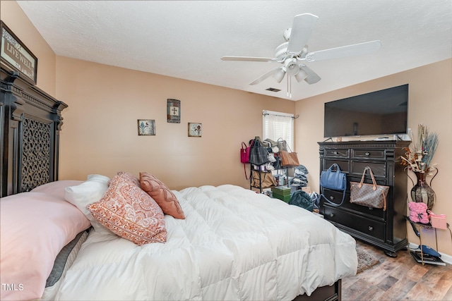 1515 Mack St, Spring Lake, NC 28390 - bedroom featuring light wood finished floors and a ceiling fan
