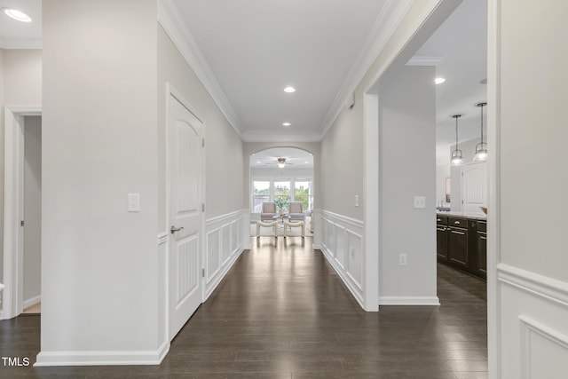 118 Manning Way, Durham, NC 27703 - corridor with dark wood finished floors, crown molding, and arched walkways