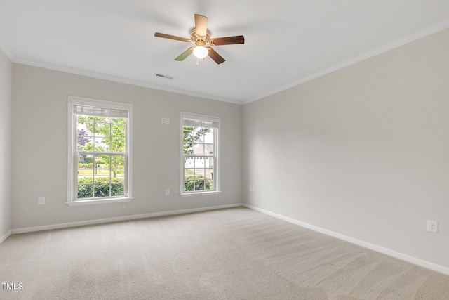 118 Manning Way, Durham, NC 27703 - empty room with crown molding, baseboards, light colored carpet, and ceiling fan