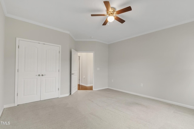 118 Manning Way, Durham, NC 27703 - unfurnished bedroom with crown molding, light carpet, a closet, baseboards, and ceiling fan