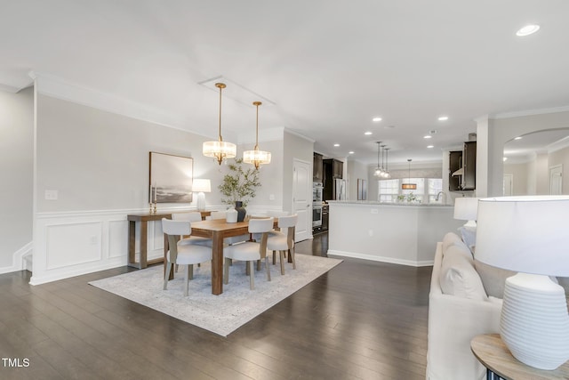 118 Manning Way, Durham, NC 27703 - dining space with ornamental molding, recessed lighting, dark wood finished floors, wainscoting, and a chandelier