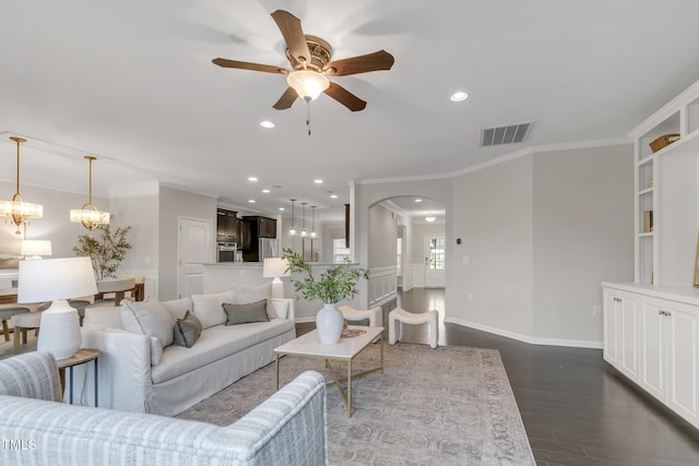 118 Manning Way, Durham, NC 27703 - living room with a ceiling fan, arched walkways, dark wood-style flooring, crown molding, and recessed lighting