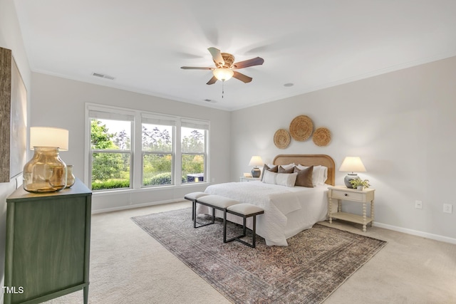 118 Manning Way, Durham, NC 27703 - bedroom with carpet, baseboards, ornamental molding, and a ceiling fan