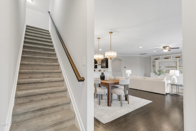 118 Manning Way, Durham, NC 27703 - staircase with ceiling fan, wood finished floors, recessed lighting, a chandelier, and baseboards