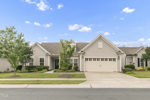 118 Manning Way, Durham, NC 27703 - view of front of property featuring concrete driveway, a garage, a front yard, and a shingled roof