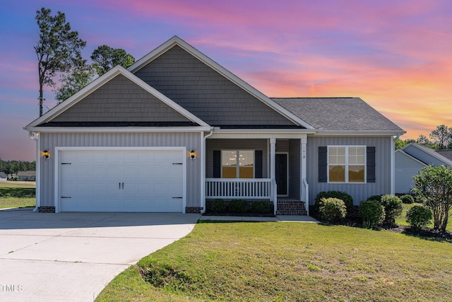 41 Tan Oak Dr, Selma, NC 27576 - view of front of property featuring board and batten siding, covered porch, a lawn, an attached garage, and concrete driveway