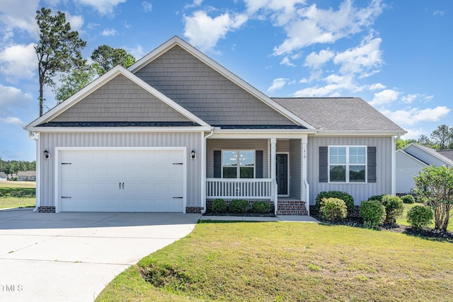 41 Tan Oak Dr, Selma, NC 27576 - view of front of property with board and batten siding, a porch, a front yard, an attached garage, and concrete driveway