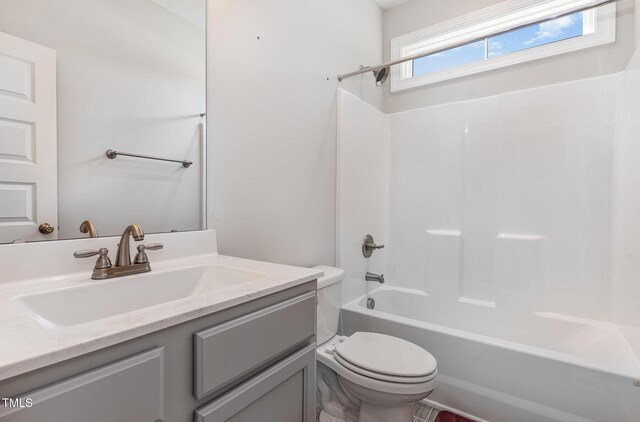 41 Tan Oak Dr, Selma, NC 27576 - bathroom featuring toilet, vanity, and shower / washtub combination
