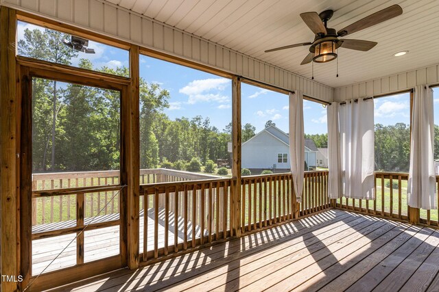 41 Tan Oak Dr, Selma, NC 27576 - unfurnished sunroom featuring ceiling fan