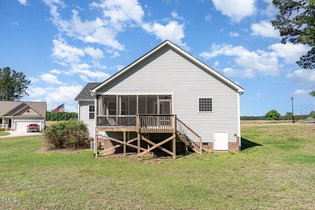 41 Tan Oak Dr, Selma, NC 27576 - back of house with a sunroom, a yard, and stairway