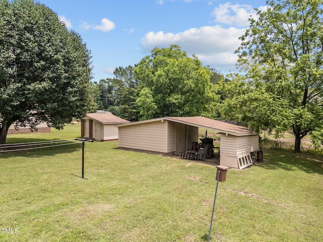 4804 Spring Forest Rd, Raleigh, NC 27616 - view of grassy yard with a shed