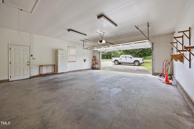 4804 Spring Forest Rd, Raleigh, NC 27616 - garage with a garage door opener