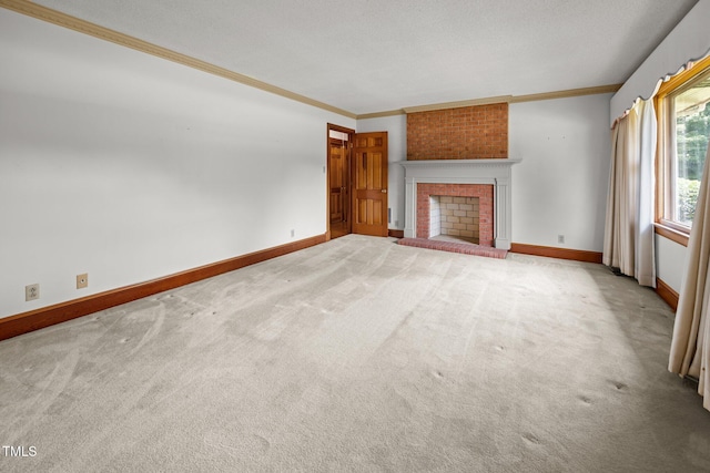 4804 Spring Forest Rd, Raleigh, NC 27616 - unfurnished living room with ornamental molding, carpet, and a fireplace