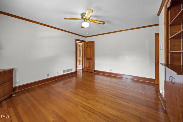 4804 Spring Forest Rd, Raleigh, NC 27616 - unfurnished room with ceiling fan, ornamental molding, and wood finished floors