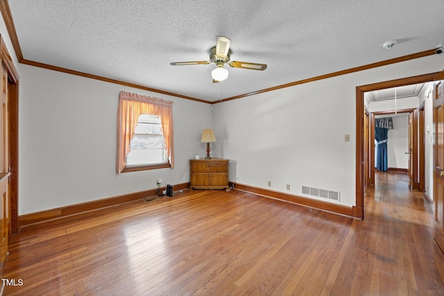 4804 Spring Forest Rd, Raleigh, NC 27616 - empty room featuring attic access, hardwood / wood-style floors, ceiling fan, a smoke detector, and crown molding