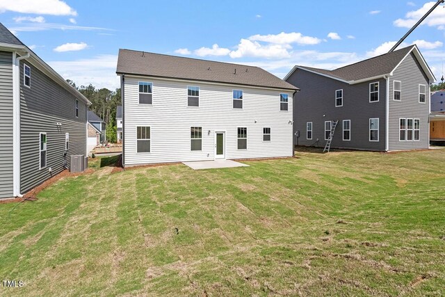 257 N Maple Walk Dr Unit 218, Garner, NC 27529 - rear view of house featuring a patio, cooling unit, and a lawn