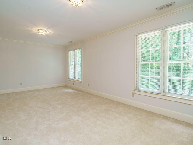 3339 Ridgecrest Ct, Raleigh, NC 27607 - empty room featuring ornamental molding and light colored carpet