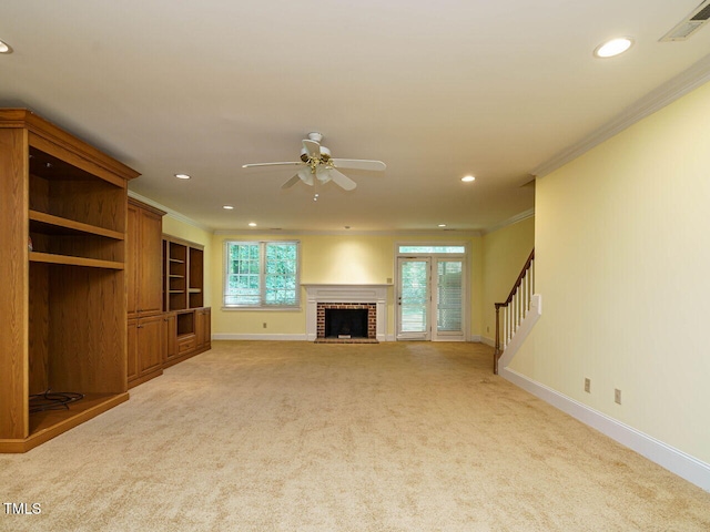 3339 Ridgecrest Ct, Raleigh, NC 27607 - unfurnished living room with ornamental molding, recessed lighting, a ceiling fan, light colored carpet, and stairs