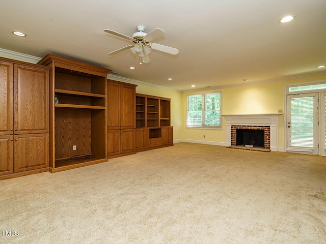 3339 Ridgecrest Ct, Raleigh, NC 27607 - unfurnished living room with ornamental molding, light carpet, recessed lighting, a fireplace, and ceiling fan