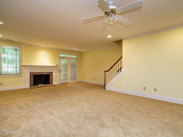 3339 Ridgecrest Ct, Raleigh, NC 27607 - unfurnished living room featuring ornamental molding, a fireplace, recessed lighting, carpet floors, and stairway
