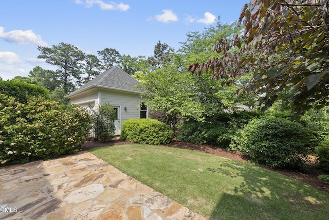 1210 Brooks Ave, Raleigh, NC 27607 - view of grassy yard with a patio area