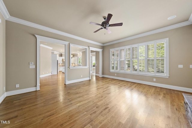 1210 Brooks Ave, Raleigh, NC 27607 - unfurnished living room featuring ceiling fan, baseboards, crown molding, and wood finished floors
