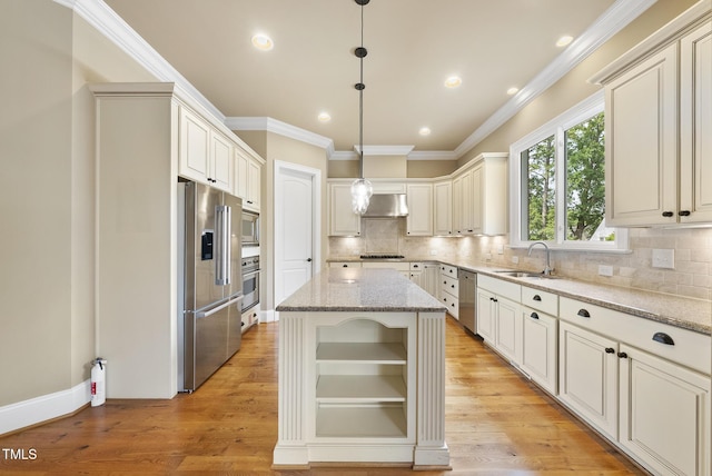 1210 Brooks Ave, Raleigh, NC 27607 - kitchen featuring stainless steel appliances, extractor fan, a sink, light stone countertops, and ornamental molding