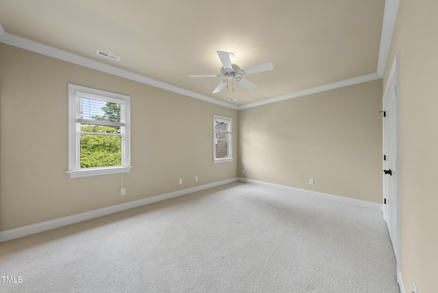 1210 Brooks Ave, Raleigh, NC 27607 - unfurnished room with crown molding, baseboards, light colored carpet, and a ceiling fan