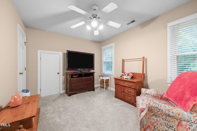 7520 Milestone Ct, Raleigh, NC 27615 - sitting room with ceiling fan, healthy amount of natural light, and light colored carpet