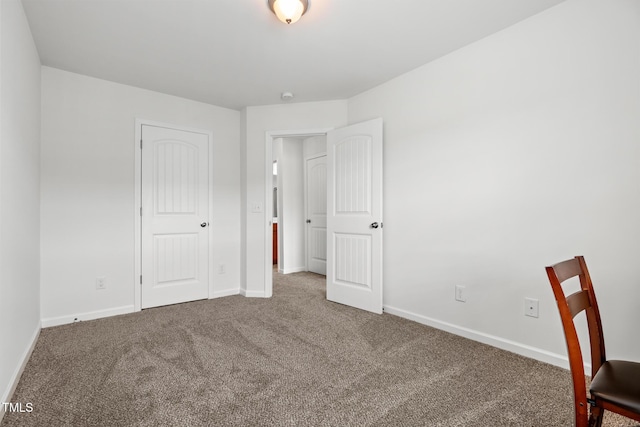 1728 Shady Oaks Dr, Wendell, NC 27591 - unfurnished bedroom with carpet flooring and baseboards