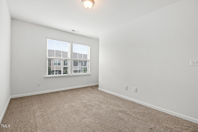 1728 Shady Oaks Dr, Wendell, NC 27591 - carpeted spare room featuring baseboards