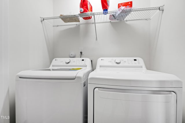 1728 Shady Oaks Dr, Wendell, NC 27591 - washroom with washer and dryer