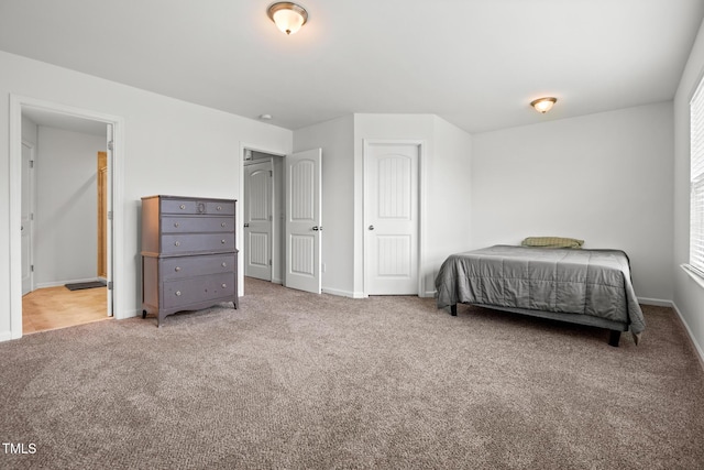1728 Shady Oaks Dr, Wendell, NC 27591 - carpeted bedroom featuring baseboards