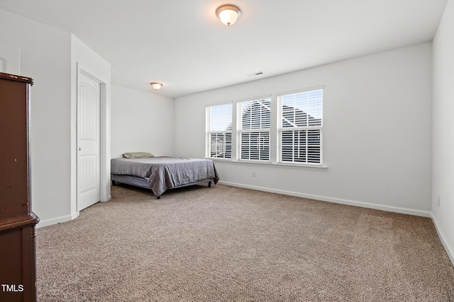 1728 Shady Oaks Dr, Wendell, NC 27591 - bedroom featuring carpet floors and baseboards