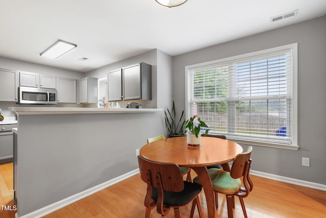 202 Stonecreek Dr, Apex, NC 27539 - dining space with light wood finished floors and baseboards