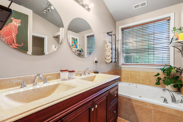 202 Stonecreek Dr, Apex, NC 27539 - bathroom featuring a tub with jets and double vanity